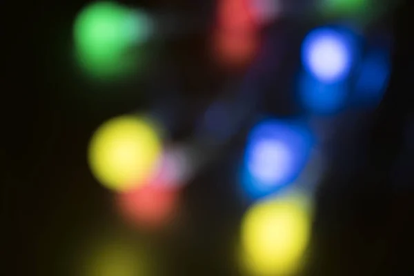 Efecto Bokeh con luces de diferentes colores para gráficos  . — Foto de Stock