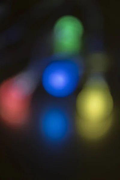 Efecto Bokeh con luces de diferentes colores para gráficos  . — Foto de Stock