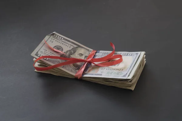 Cash gift with American currency to increase financial fortune — Stock Photo, Image