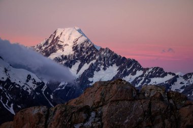 Scenic sunset view of Mt Cook with colorful sky, NZ clipart