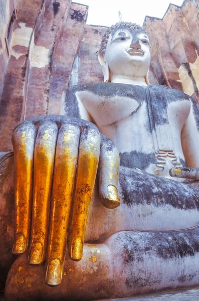 Sitting Buddha with golden hand in Wat Si Chum temple, Sukhothai — Stock Photo, Image