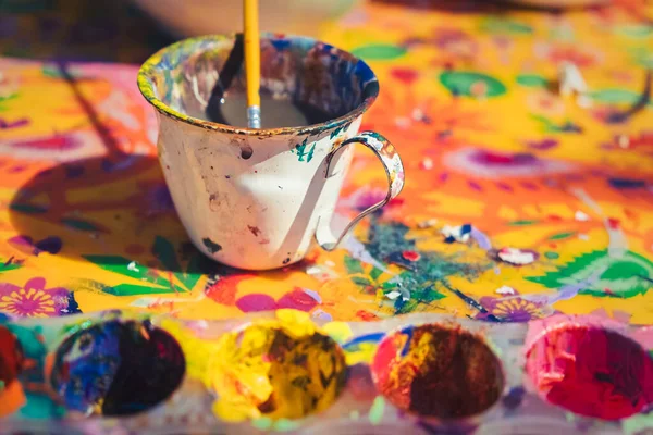 Detail View Messy Painting Colours Painter Cup Paintbrush Colorful Canvas — Stock Photo, Image