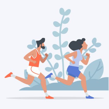 Erkek ve kadın çekici bir şekilde parkta koşup koşuyor.