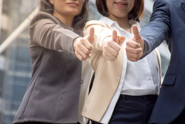 Asian business team thumb up for good work — Stock Photo, Image