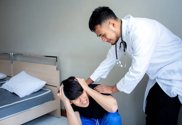 Doctor comforting patient in medical office because patient receiving bad news and crying