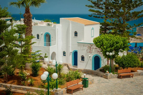 Greek architecture - white buildings, sea and blue windows, Boug — Stock Photo, Image