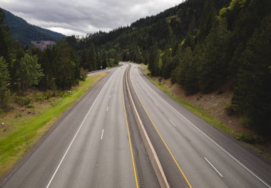 Interstate Highway Through Forrest with Tilt-Shift clipart