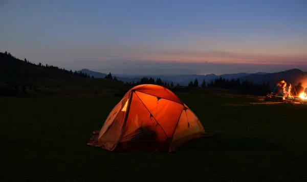 hiking tent in mountains night