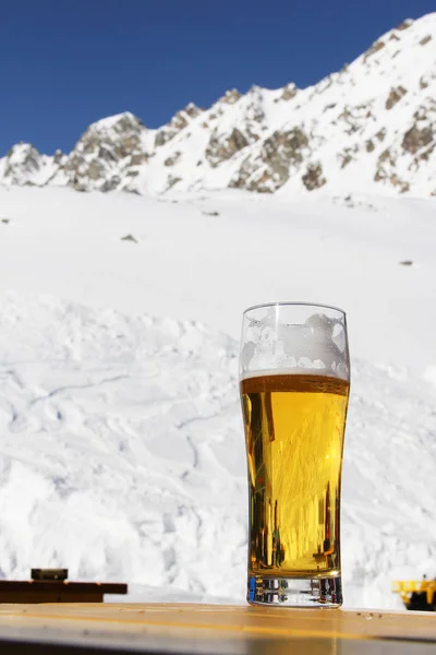 Beer in winter mountains