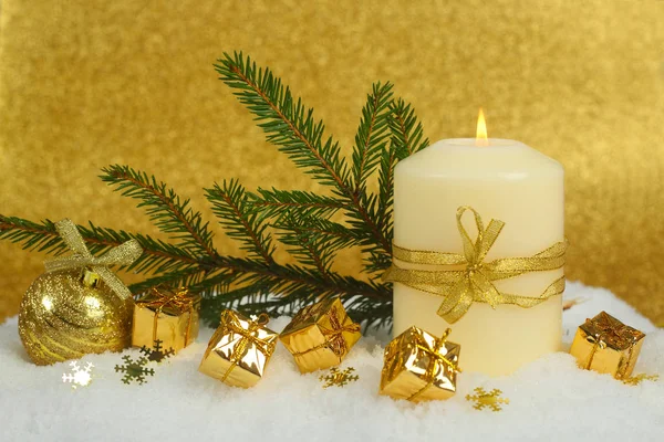 Christmas candle in snow — Stock Photo, Image