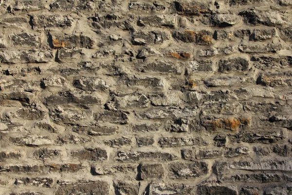 Old gray stone wall background — Stock Photo, Image