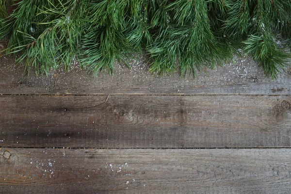 Tarjeta de Navidad sobre fondo de madera —  Fotos de Stock