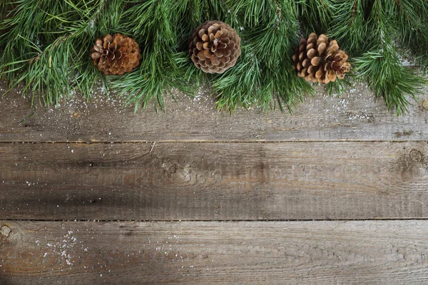 Tarjeta de Navidad sobre fondo de madera —  Fotos de Stock