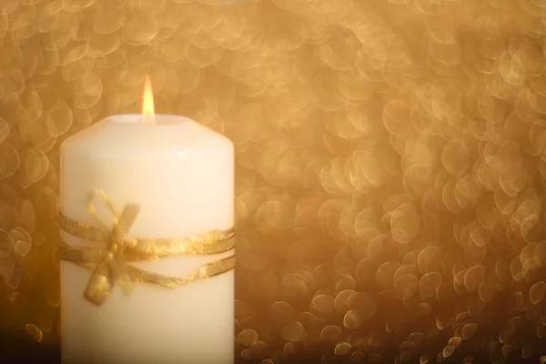 Christmas candle on shiny background — Stock Photo, Image