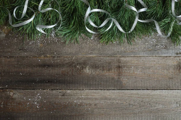 Tarjeta de Navidad sobre fondo de madera —  Fotos de Stock