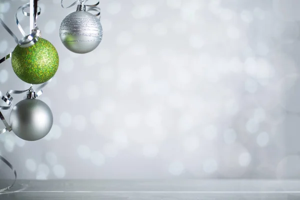 Silver Christmas balls with ribbon — Stock Photo, Image