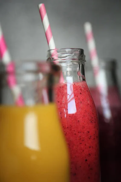 Fresh juices in a bottles — Stock Photo, Image