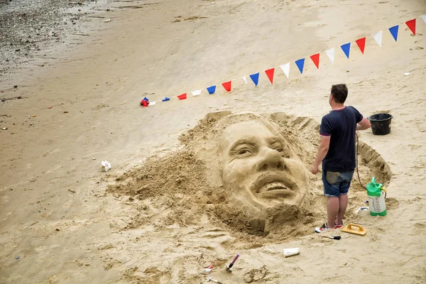 Escultura de arena en una playa —  Fotos de Stock
