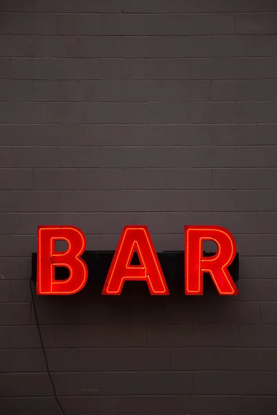 Vintage neon sign bar in red — Stock Photo, Image