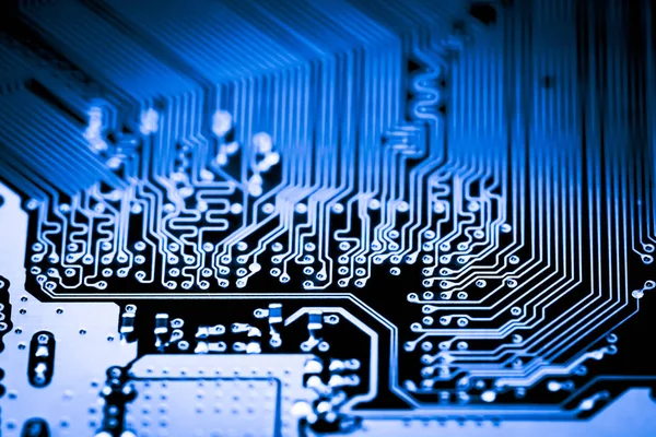 Primer plano de los circuitos electrónicos en tecnología en el fondo de la placa principal (placa principal, placa base de la CPU, placa lógica, placa del sistema o mobo ) —  Fotos de Stock