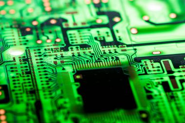 Teknoloji elektronik devrelerin anakart arka plan (ana kurulu, cpu anakart, mantık kurulu, sistem kartı veya mobo yakın çekim)