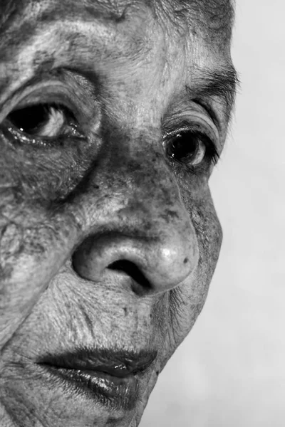 Lonely senior woman portrait sad depressed, emotion, feelings, thoughtful, senior, old woman, wait, gloomy, concerned, covering her face, Human face expressions — Fotografia de Stock