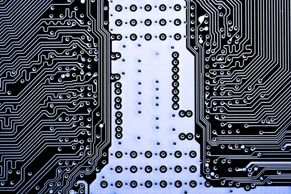Primer plano abstracto de los circuitos electrónicos en la tecnología en el fondo de la computadora de la placa principal (placa lógica, placa base de la CPU, placa principal, placa del sistema, mobo ) — Foto de Stock