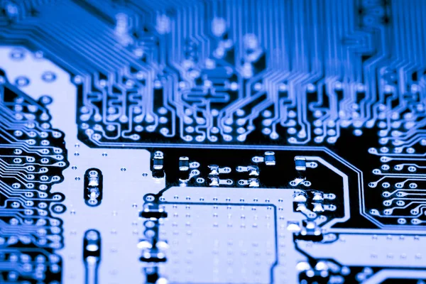 Primer plano abstracto de los circuitos electrónicos en la tecnología en el fondo de la computadora de la placa principal (placa lógica, placa base de la CPU, placa principal, placa del sistema, mobo ) —  Fotos de Stock