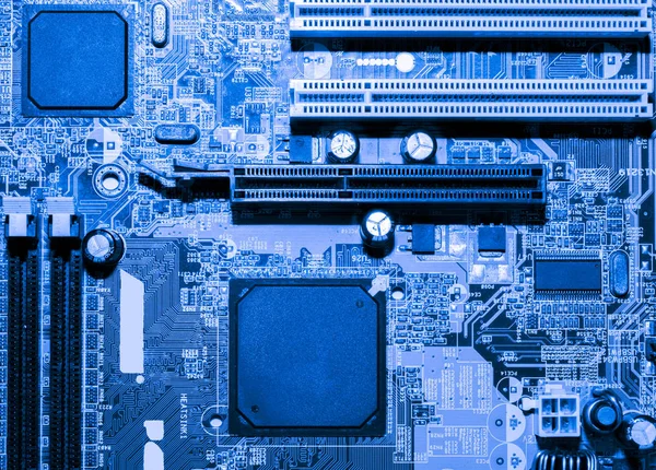 Nahaufnahme elektronischer Schaltungen in der Technik auf dem Hintergrund des Mainboards (Logikplatine, CPU-Motherboard, Hauptplatine, Systemplatine, Mobo)) — Stockfoto