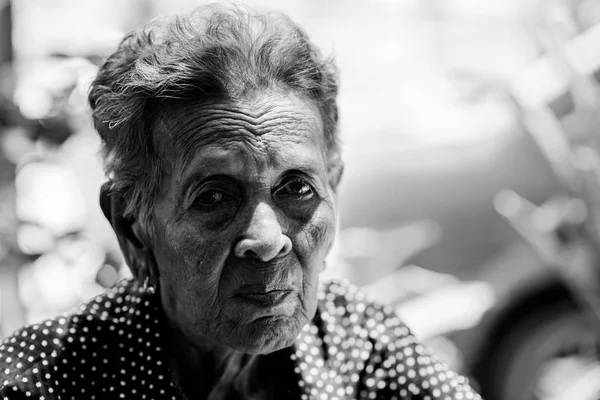 Lonely senior woman ,elderly,old woman,feelings,thoughtful, portrait sad depressed,wait, gloomy, worried, covering her face, Human face expressions — Stock Photo, Image