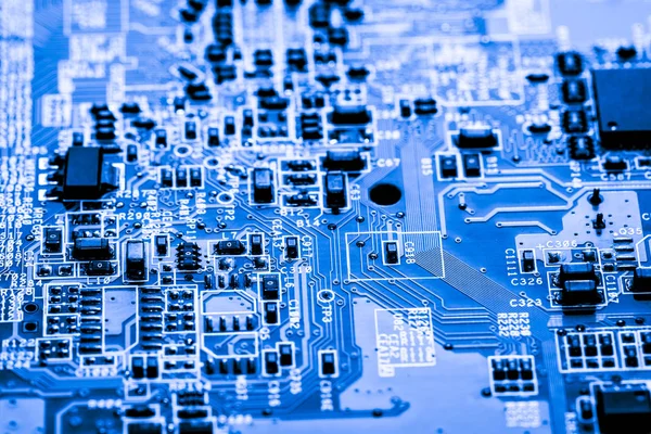 Resumen, primer plano de los circuitos electrónicos en el fondo de la computadora de la tecnología de la placa principal (placa lógica, placa base de la CPU, placa principal, placa del sistema, mobo ) —  Fotos de Stock