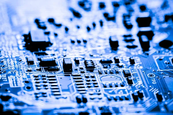 Resumen, primer plano de los circuitos electrónicos en el fondo de la computadora de la tecnología de la placa principal (placa lógica, placa base de la CPU, placa principal, placa del sistema, mobo ) —  Fotos de Stock