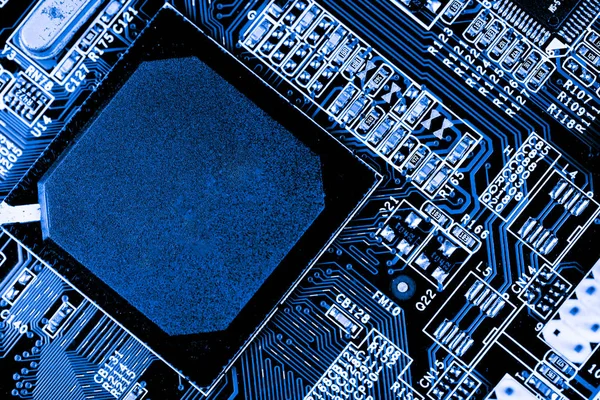 Resumen, primer plano de los circuitos electrónicos en el fondo de la computadora de la tecnología de la placa principal (placa lógica, placa base de la CPU, placa principal, placa del sistema, mobo ) — Foto de Stock