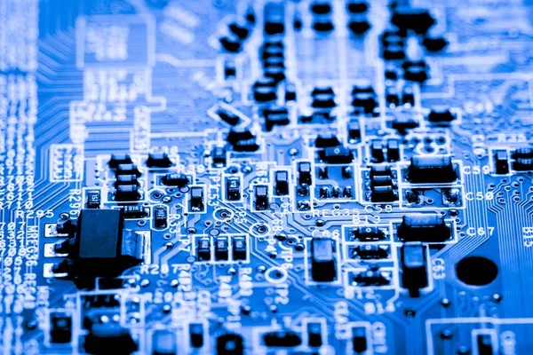 Resumen, primer plano de los circuitos electrónicos en el fondo de la computadora de la tecnología de la placa principal (placa lógica, placa base de la CPU, placa principal, placa del sistema, mobo ) —  Fotos de Stock