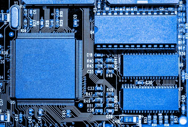 Abstrakt, närbild på elektroniska kretsar, ser vi tekniken för moderkortet, vilket är den viktiga bakgrunden på datorn. (moderkort, cpu moderkort, Main board, systemkortet, mobo) — Stockfoto