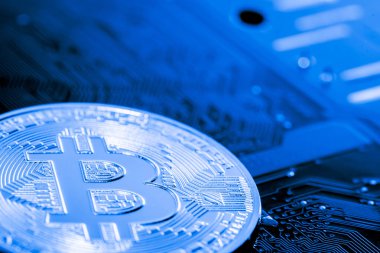 Abstract, Golden Bitcoin para üstünde bilgisayar.