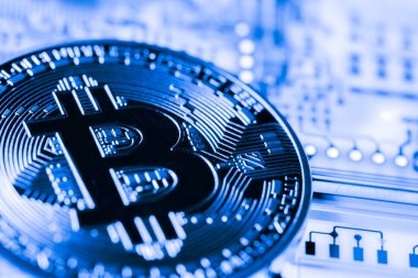 Abstract, Golden Bitcoin para üstünde bilgisayar.