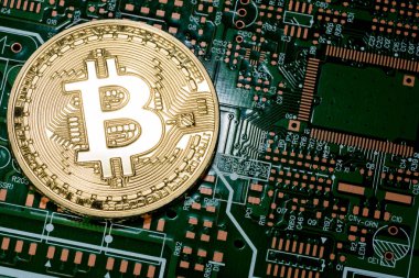 Abstract, Golden Bitcoin para üstünde bilgisayar.