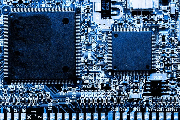 抽象化、電子回路のメインボードのコンピューター技術の背景にクローズ アップ。(ロジック ボード、cpu マザーボード、メインボード、システム ボード、マザー) — ストック写真