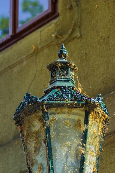 Vintage lantern under dust and web — Stock Photo, Image