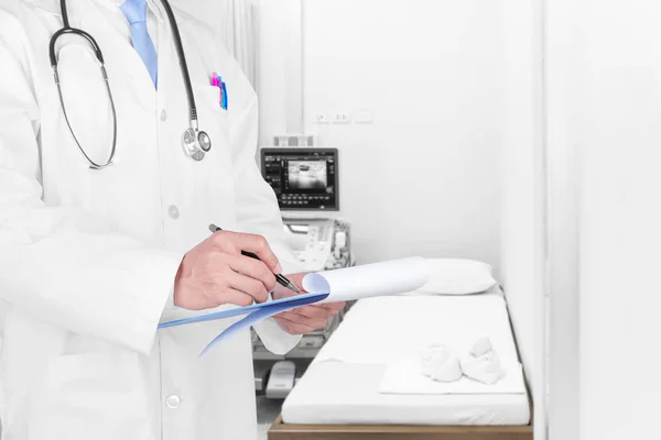 Doctor writing a medical prescription with medical background