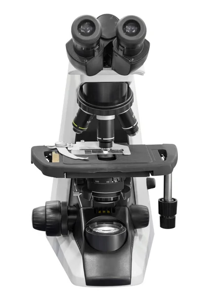 Microscópio isolado em fundo branco com caminho de recorte — Fotografia de Stock
