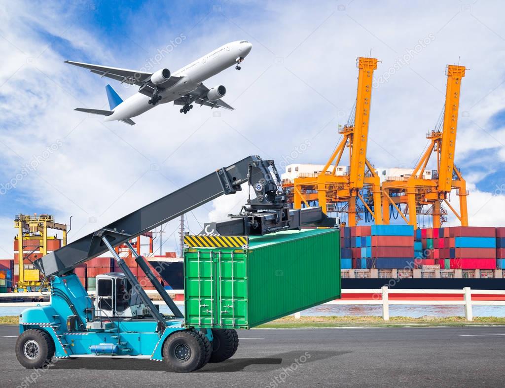Crane lifts a container to commercial delivery cargo container truck in an industrial harbor and cargo plane flying above ship port for logistic import export concept