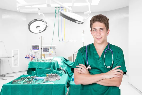 Young doctor smiling in the hospital room — Stock Photo, Image