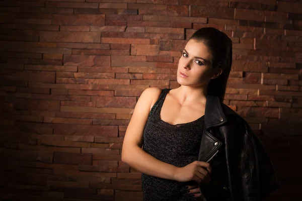 Stylish woman with leather jacket