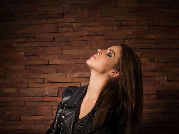 Stylish woman with leather jacket — Stock fotografie