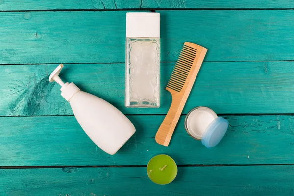 Skincare essentials on a wooden background — Stock Photo, Image