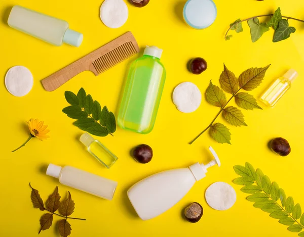 Sarı bir arka plan üzerinde kozmetik