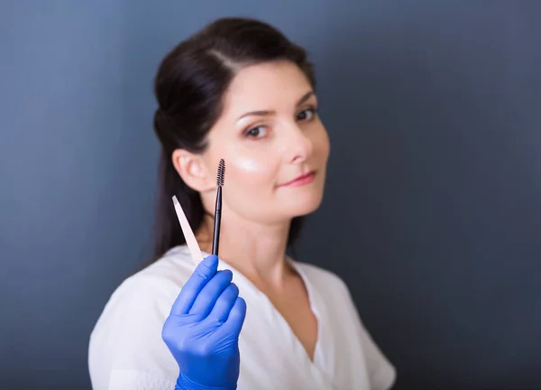 Woman cosmetologist in a spa salon — Stock Photo, Image