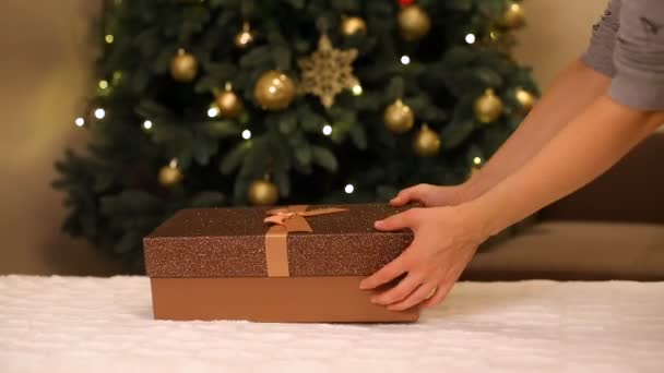 Woman Opening Christmas Presents — Stock Video